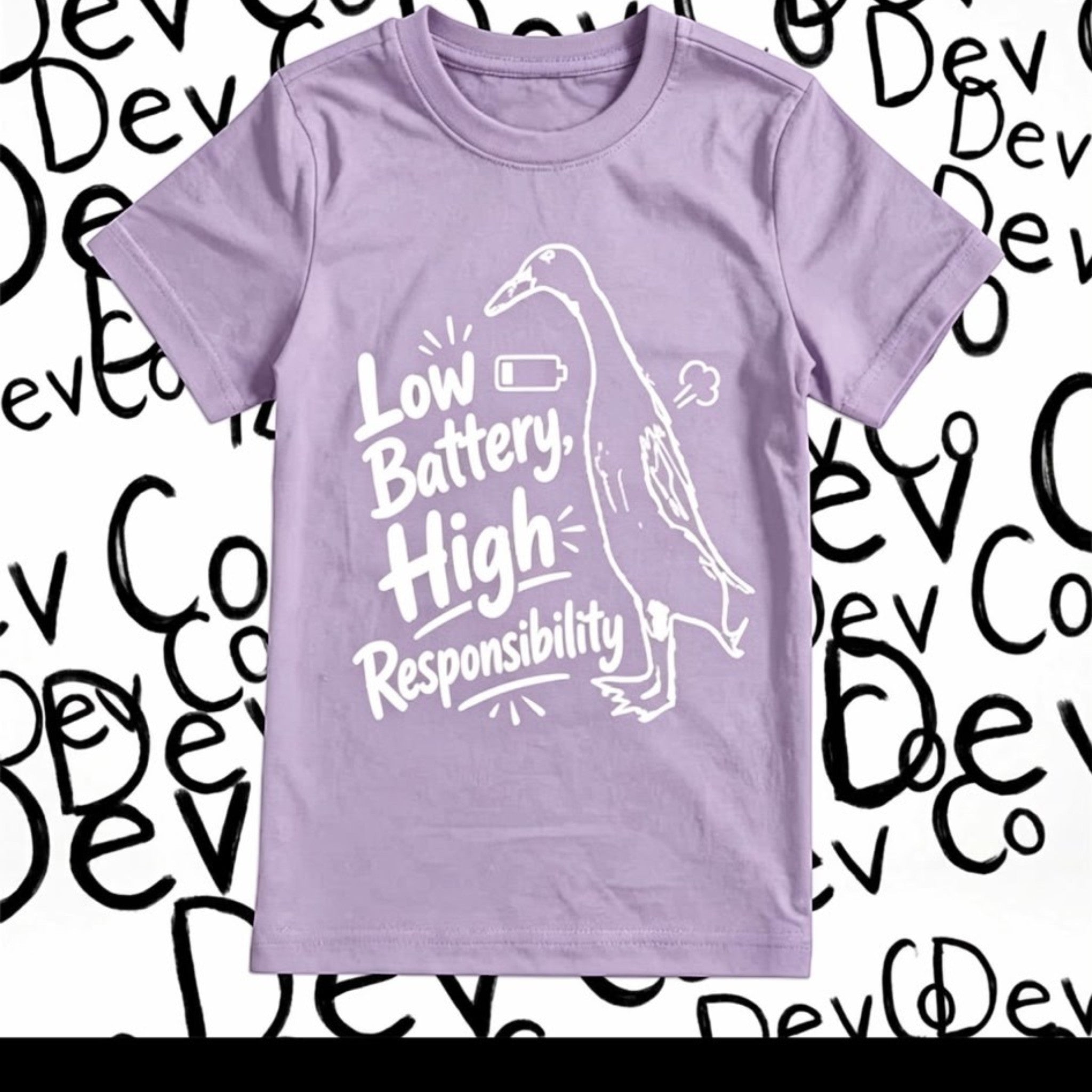 Dev co clothing light purple 100% organic cotton t-shirt with white graphic of a duck and text "Low Battery, High Responsibility".