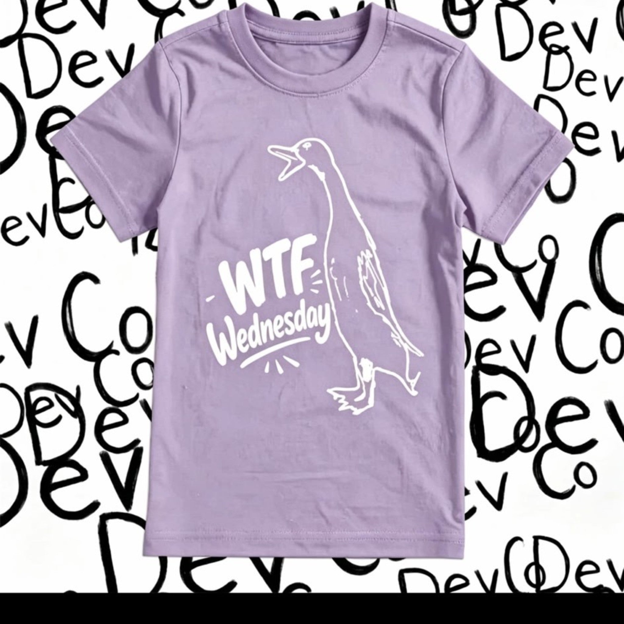 Dev co clothing light purple 100% organic cotton t-shirt with a white graphic of a duck and "WTF Wednesday" text.